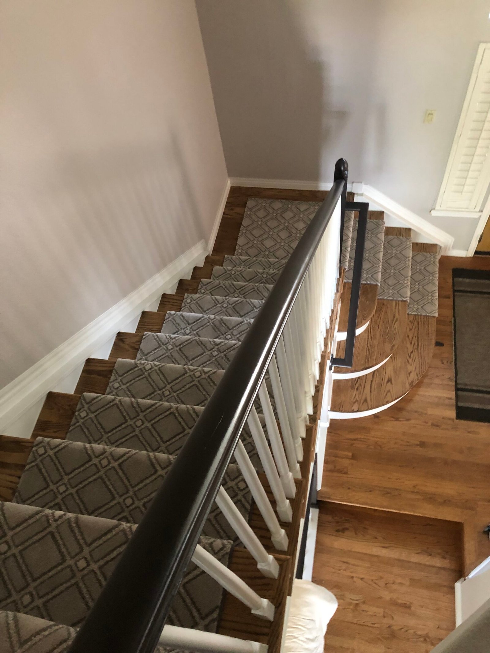 hardwood staircase with custom carpet runner arvada